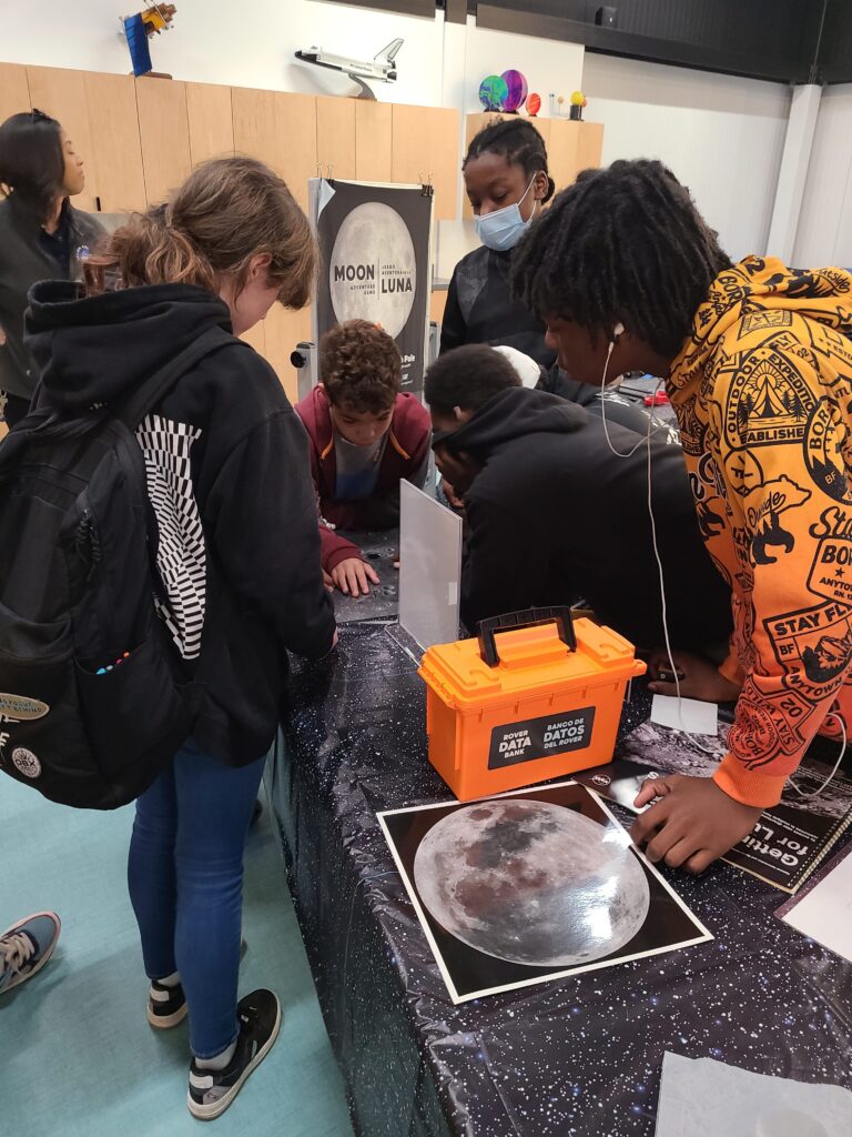 Several students gathered around a table